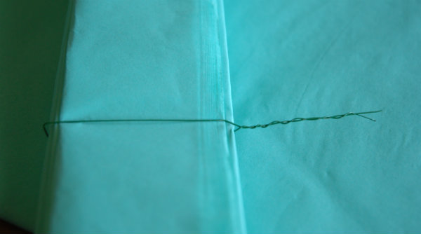 Tissue pom twisted wire